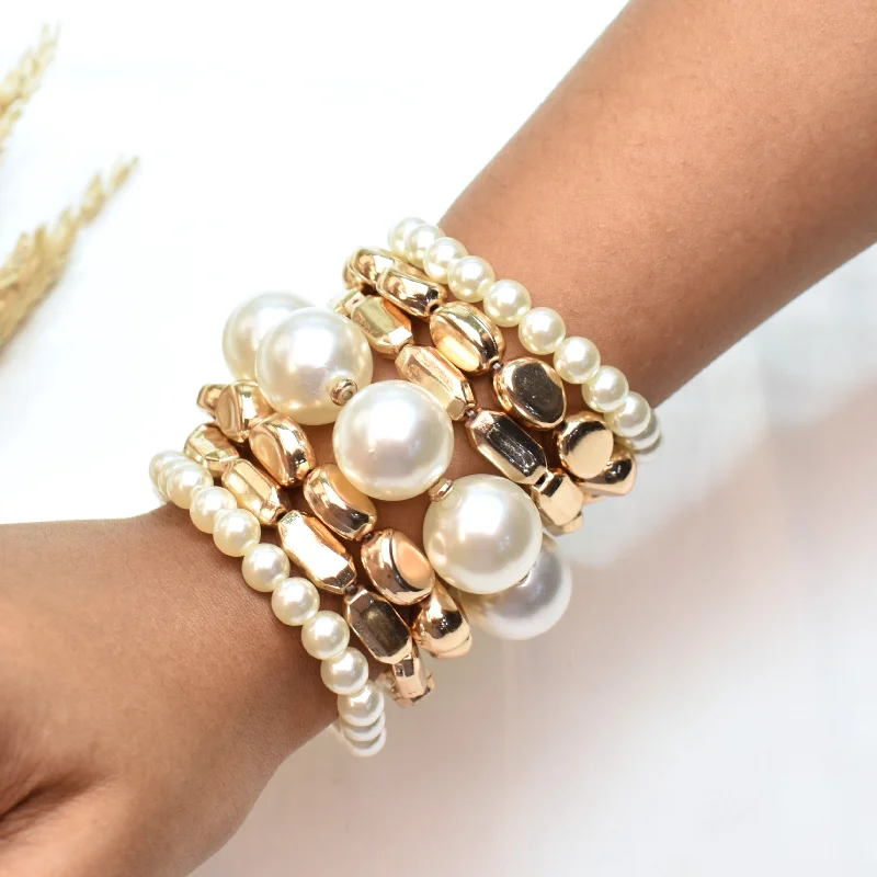 women vintage bangles -TFC Pearl Power Gold Plated Bracelet (set of 7)