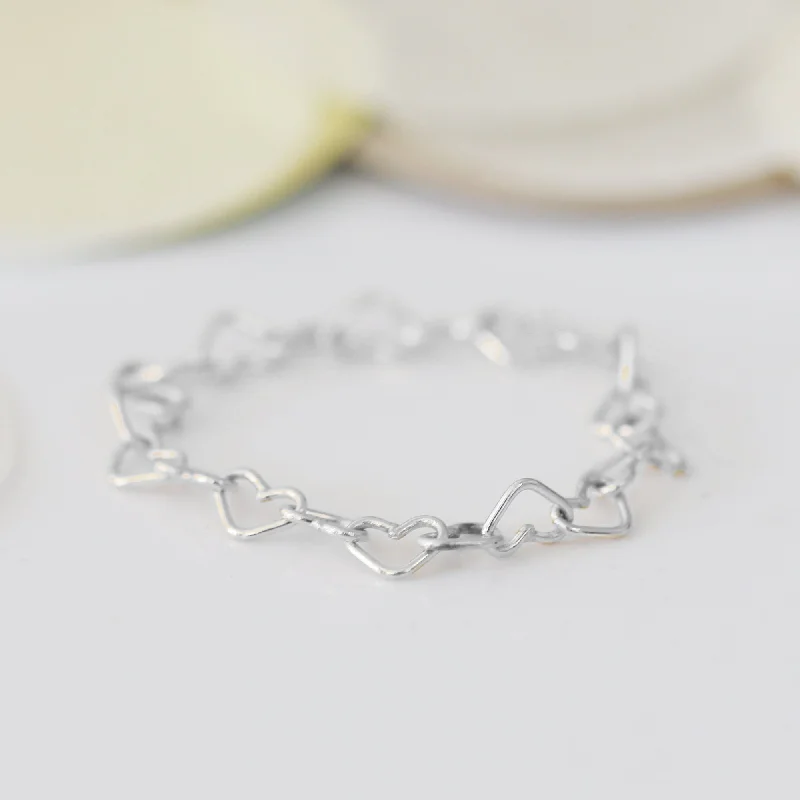 women chic rings -CONNECTED HEART CHAIN RING